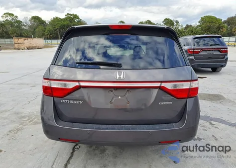 2012 Honda Odyssey Touring z USA, uszkodzony, nr VIN 5FNRL5H94CB144672
